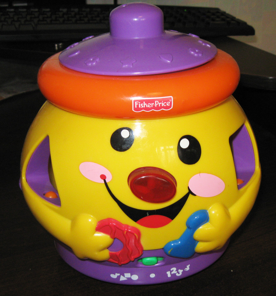 Волшебный горшочек. Волшебный горшочек Fisher Price. Развивающий горшочек Fisher Price. Игрушка сортер горшочек детский мир. Волшебный горшок игрушка.